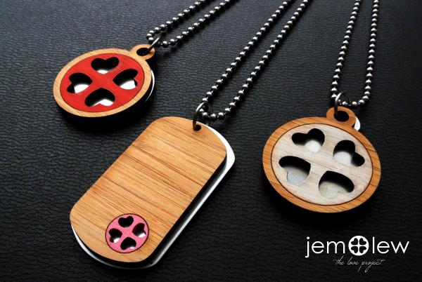 Photo of 3 bamboo and stainless steel necklaces with heart cutouts