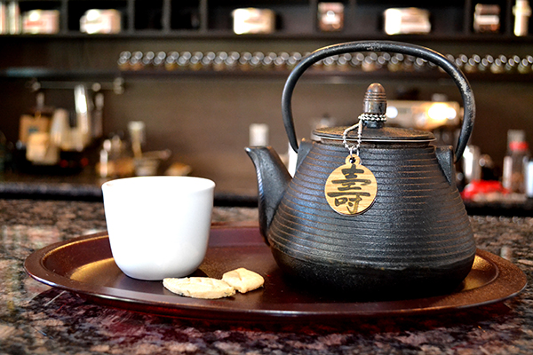 Pot of tea with jewelry at House of Steep