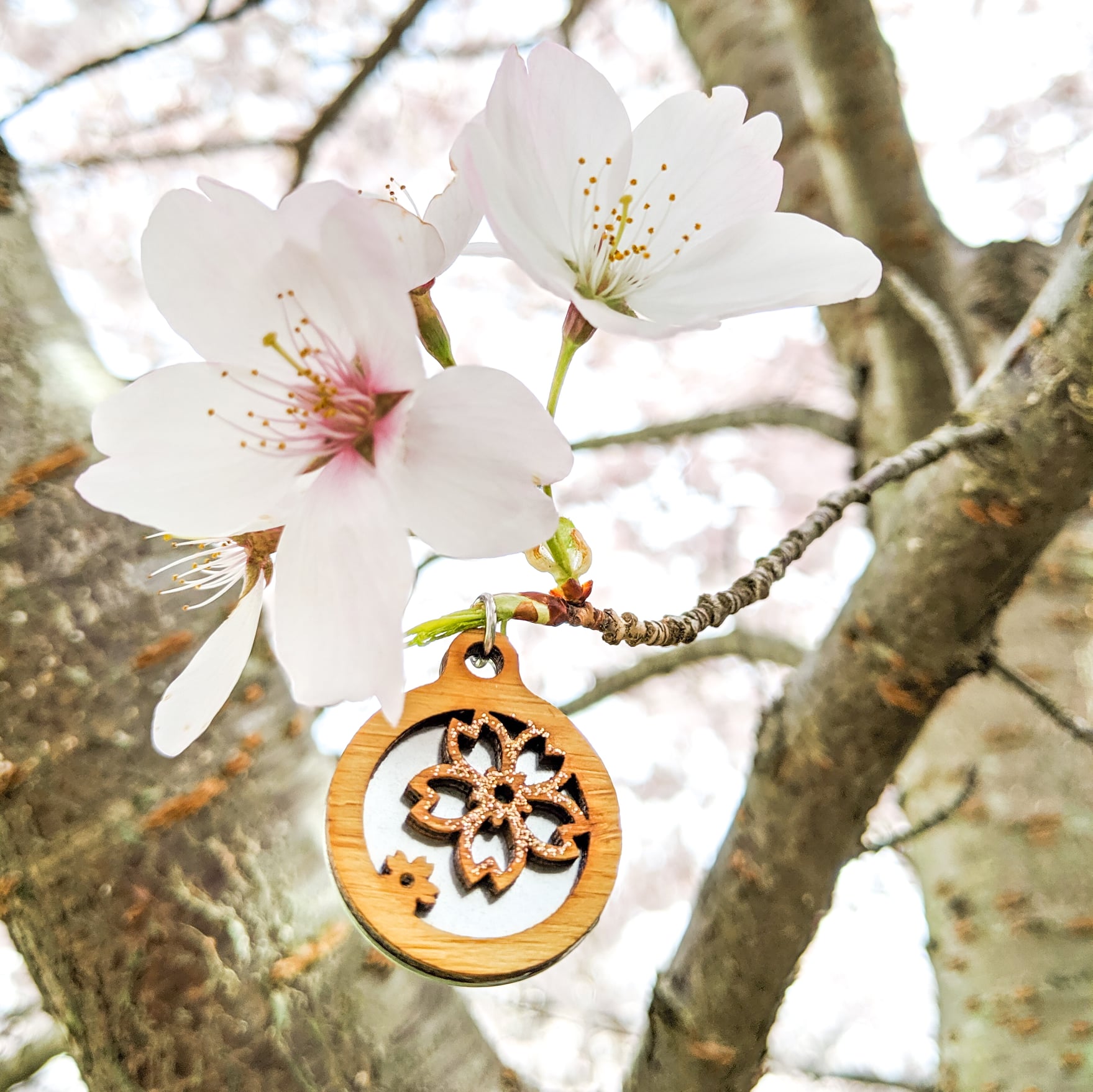 Rose gold double cherry blossom bamboo necklace in tree